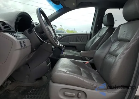 2010 Honda Odyssey Exl z USA, uszkodzony, nr VIN 5FNRL3H79AB007842